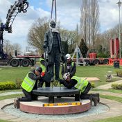 Statue being installed on plinth by MTEC of Ware